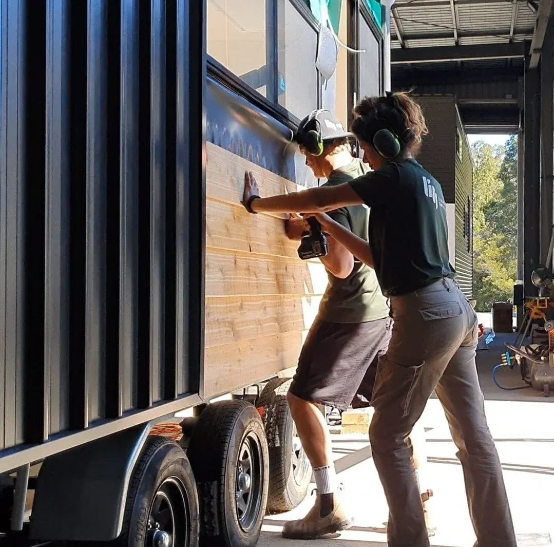 Sunshine Tiny Houses team at work on a tiny house in the Noosaville factory